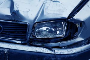 Car accident damages headlamp