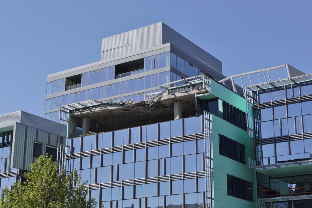 A zoomed-in look at damage to a Google office building in the South Lake Union area of Seattle, following a fatal crane collapse on April 27, 2019.